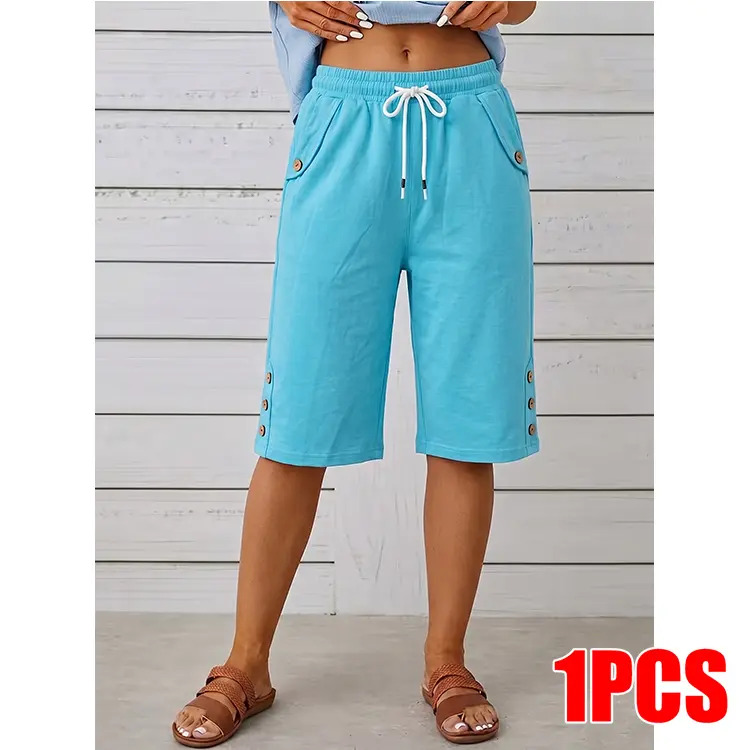 Women's loose-fit Bermuda shorts featuring an elastic waistband with a drawstring.