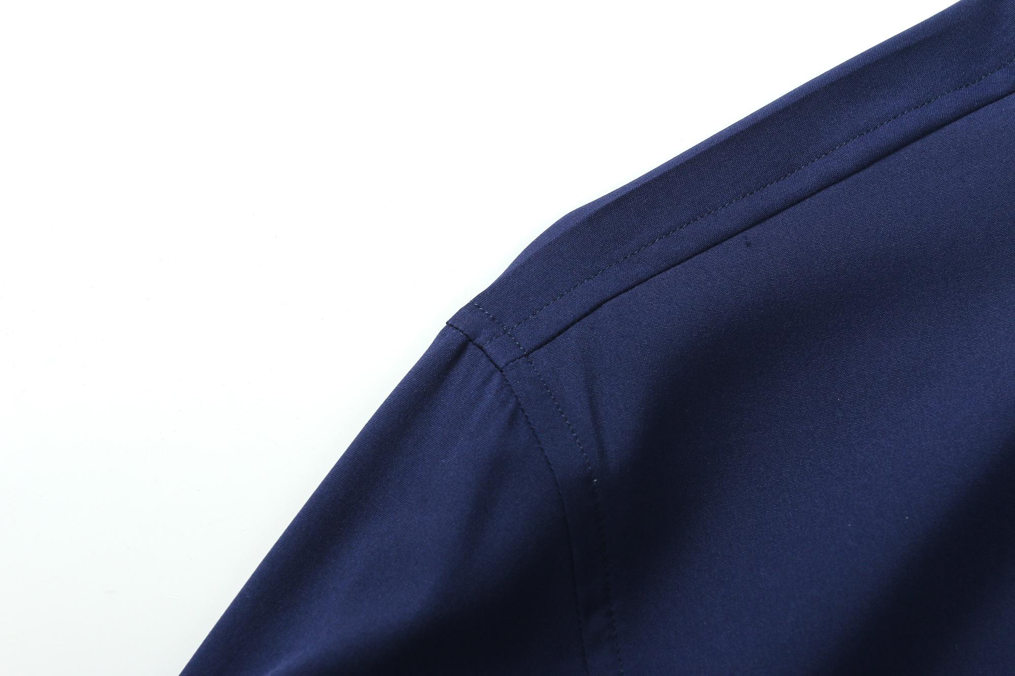 Men's solid-color long-sleeve shirt featuring a notched lapel design