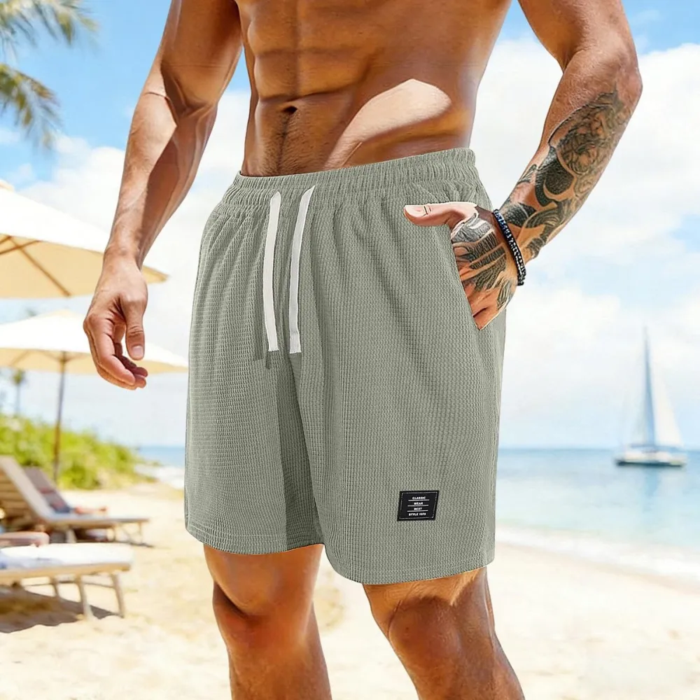 solid color, men’s casual shorts with side pockets and a drawstring elastic waistband