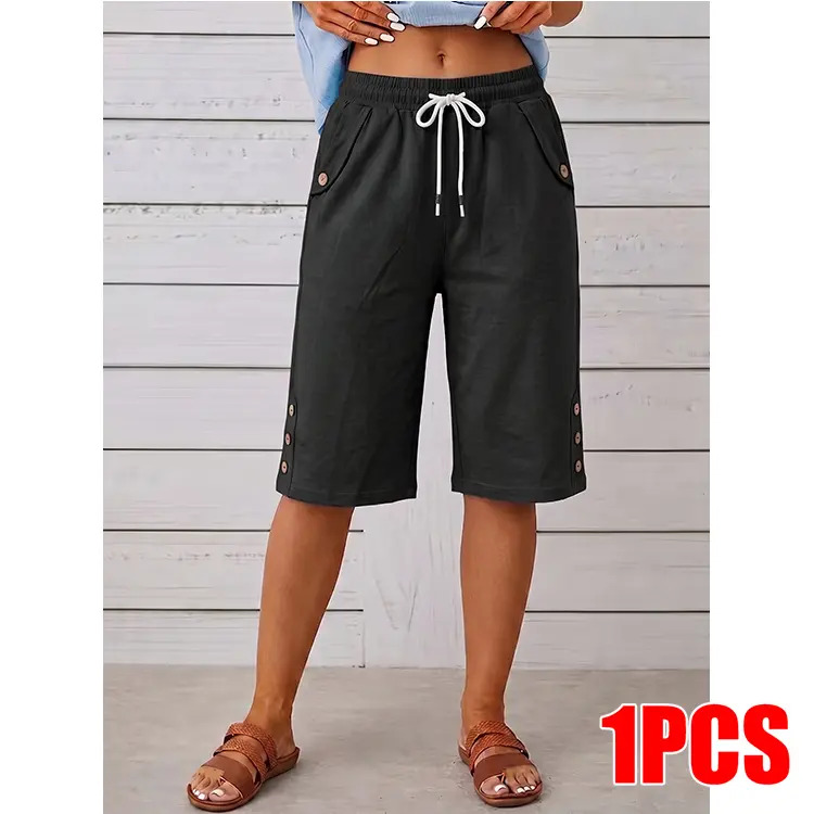 Women's loose-fit Bermuda shorts featuring an elastic waistband with a drawstring.