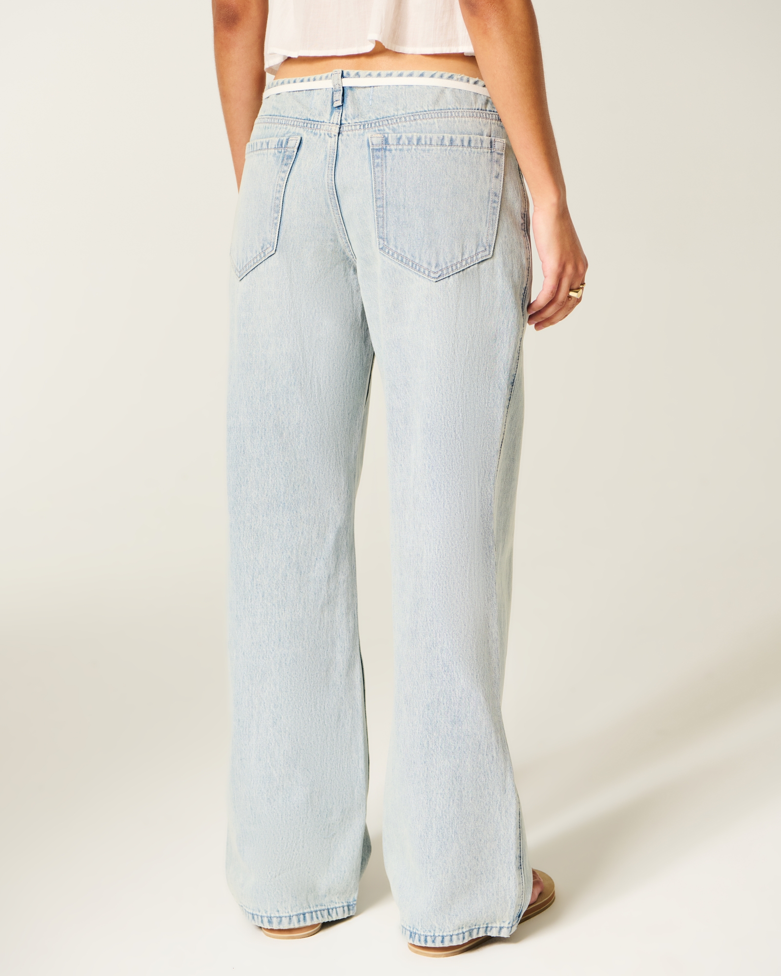 Ultra Low-Rise Light Wash Buckle Back Baggy Jeans