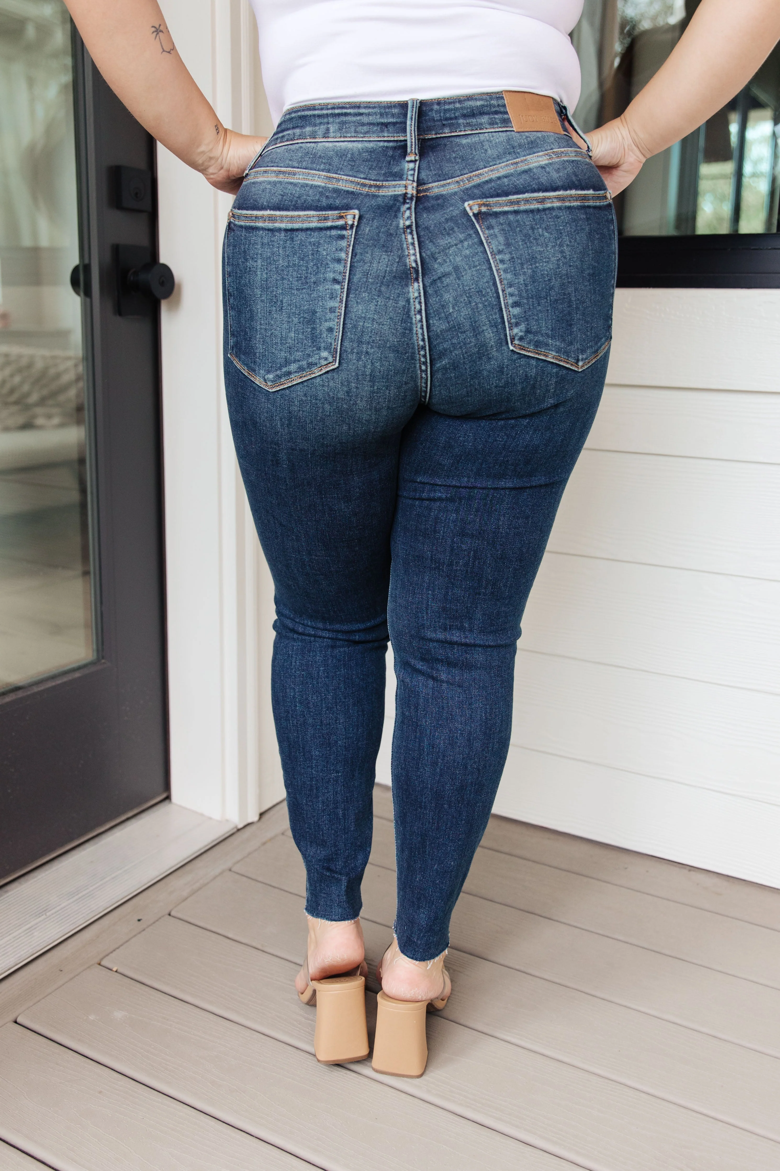 Blue Lydia Mid Rise Vintage Raw Hem Skinny Jeans