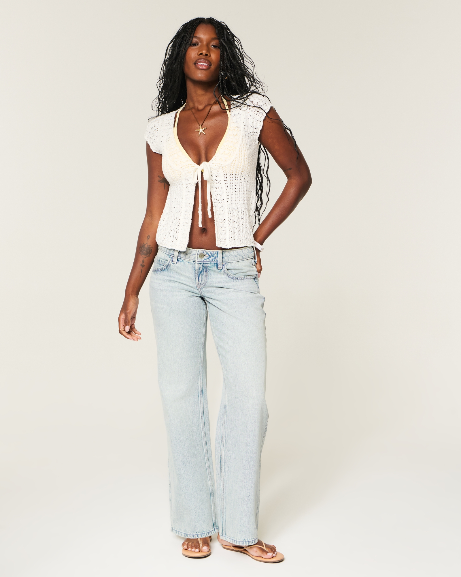 Ultra Low-Rise Light Wash Buckle Back Baggy Jeans