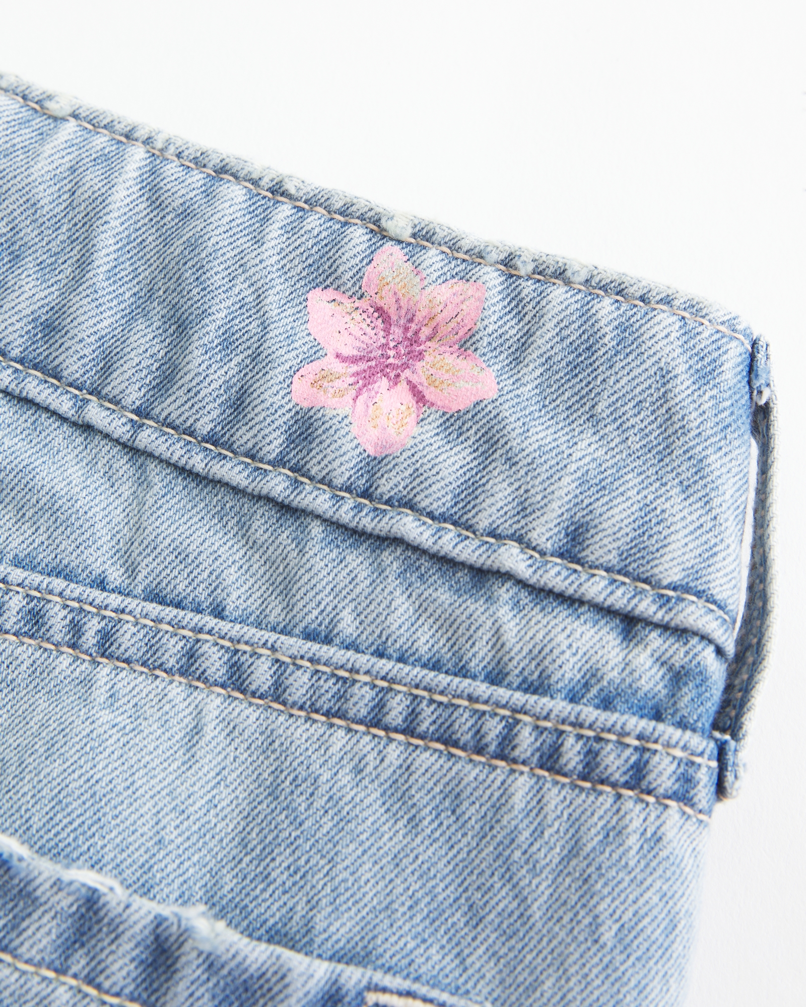 Ultra Low-Rise Light Wash Buckle Back Baggy Jeans