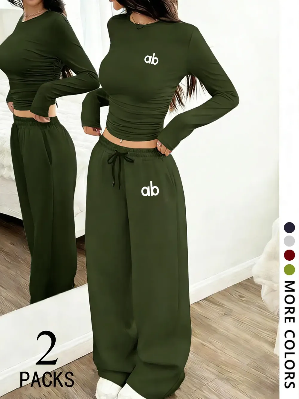 Women's two-piece set: a casual, loose-fitting long-sleeved top paired with straight-leg trousers.