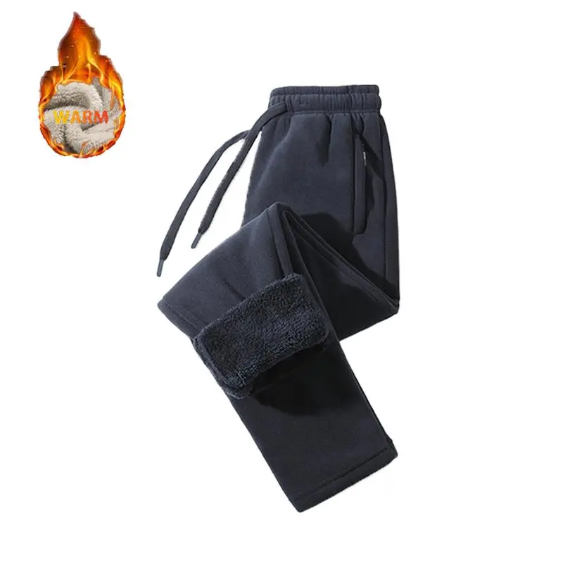 Unisex fleece-lined sweatpants with brushed interior, flat front design, zippered pockets, and a relaxed fit