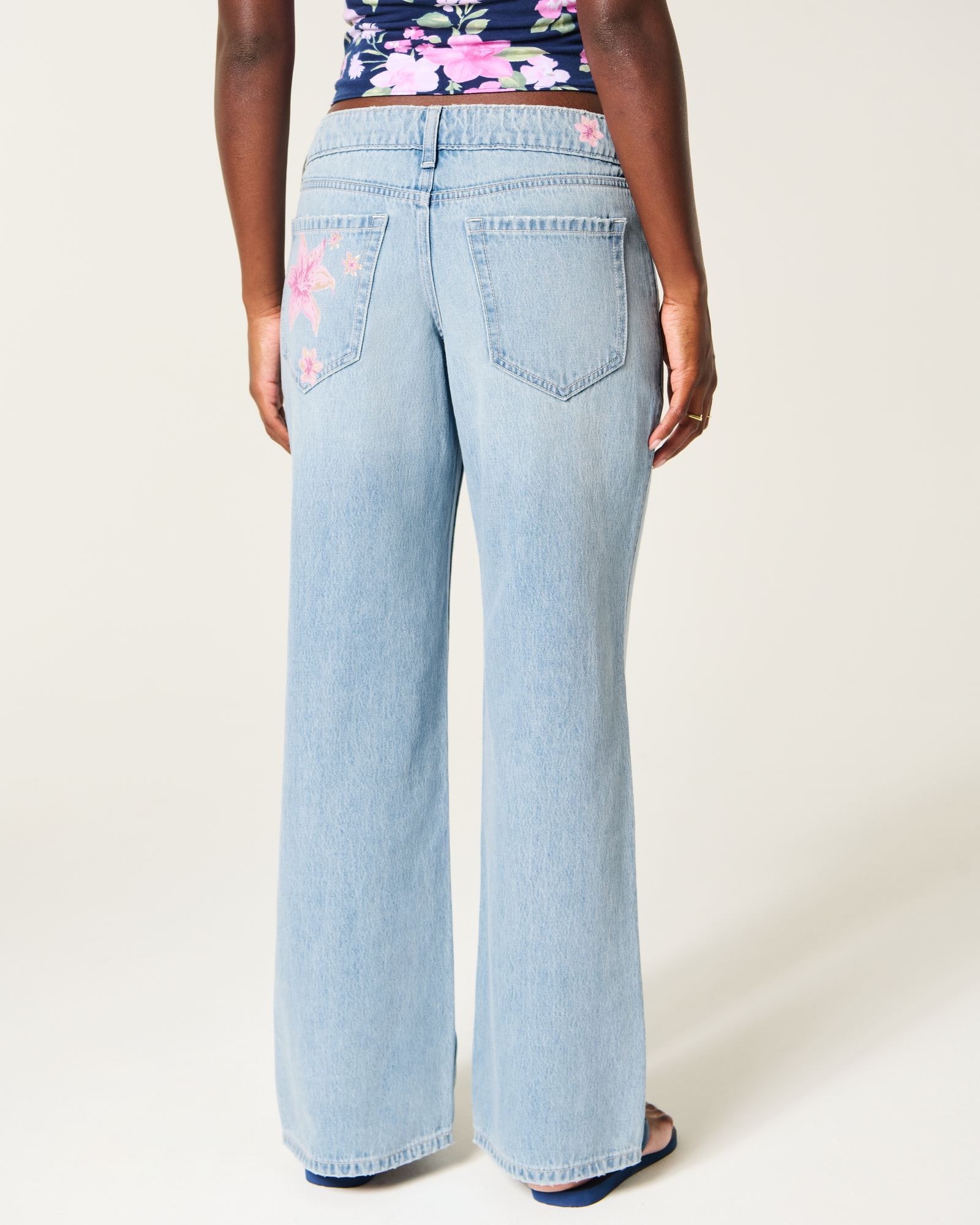 Ultra Low-Rise Light Wash Buckle Back Baggy Jeans