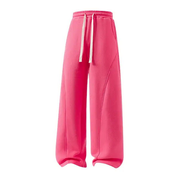 Men's solid-color drawstring trousers featuring a curved cut design.