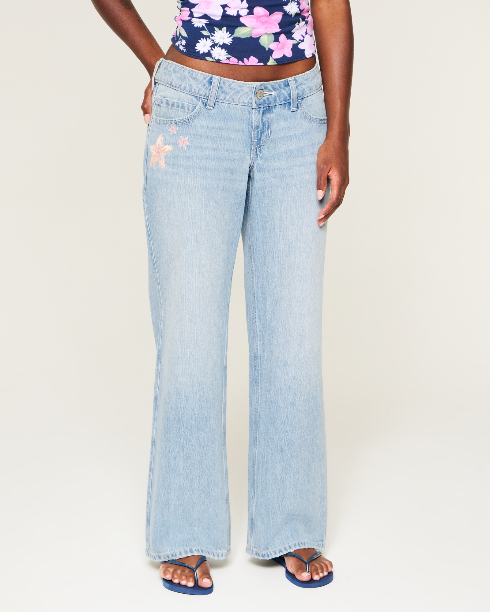 Ultra Low-Rise Light Wash Buckle Back Baggy Jeans