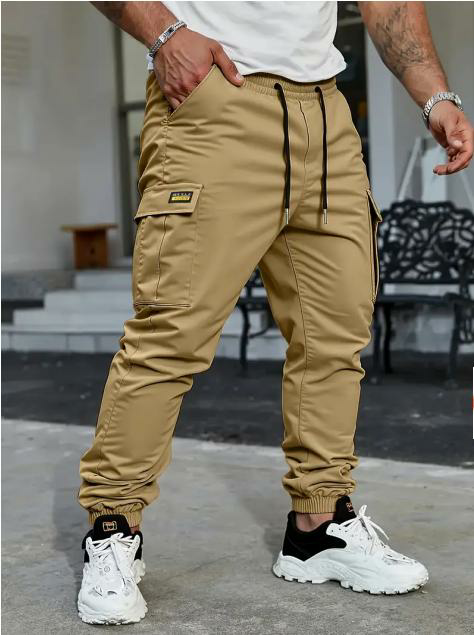 Men's solid color tactical work pants with multiple pockets and drawstring design