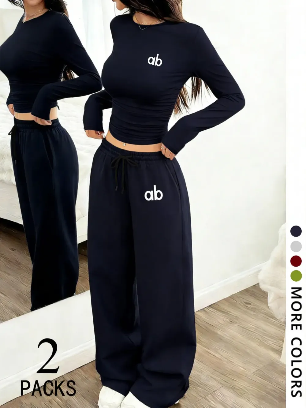 Women's two-piece set: a casual, loose-fitting long-sleeved top paired with straight-leg trousers.