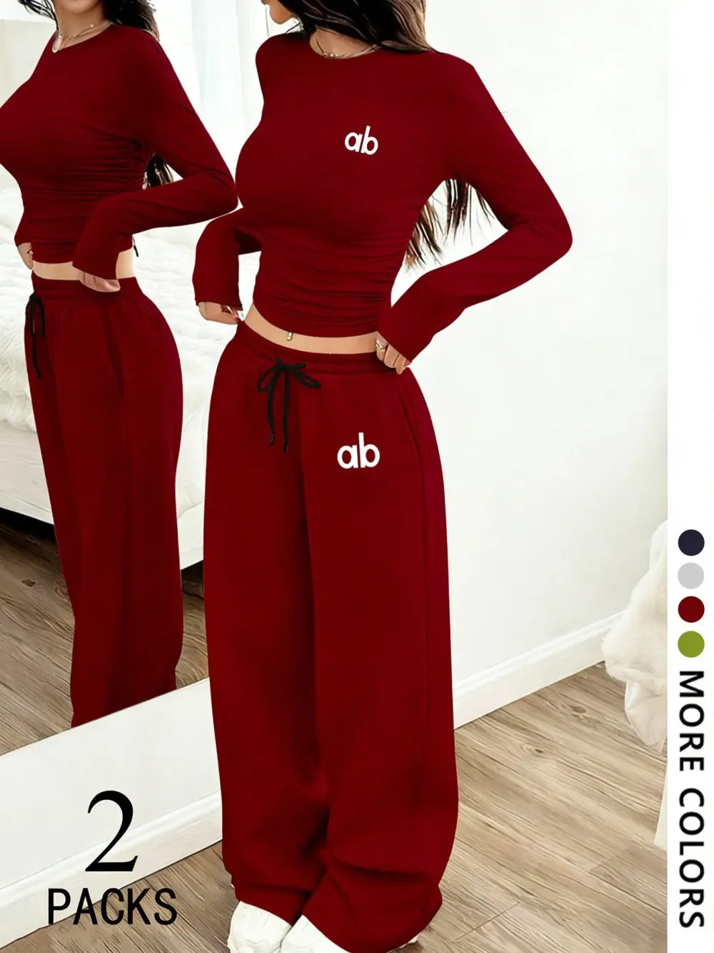 Women's two-piece set: a casual, loose-fitting long-sleeved top paired with straight-leg trousers.