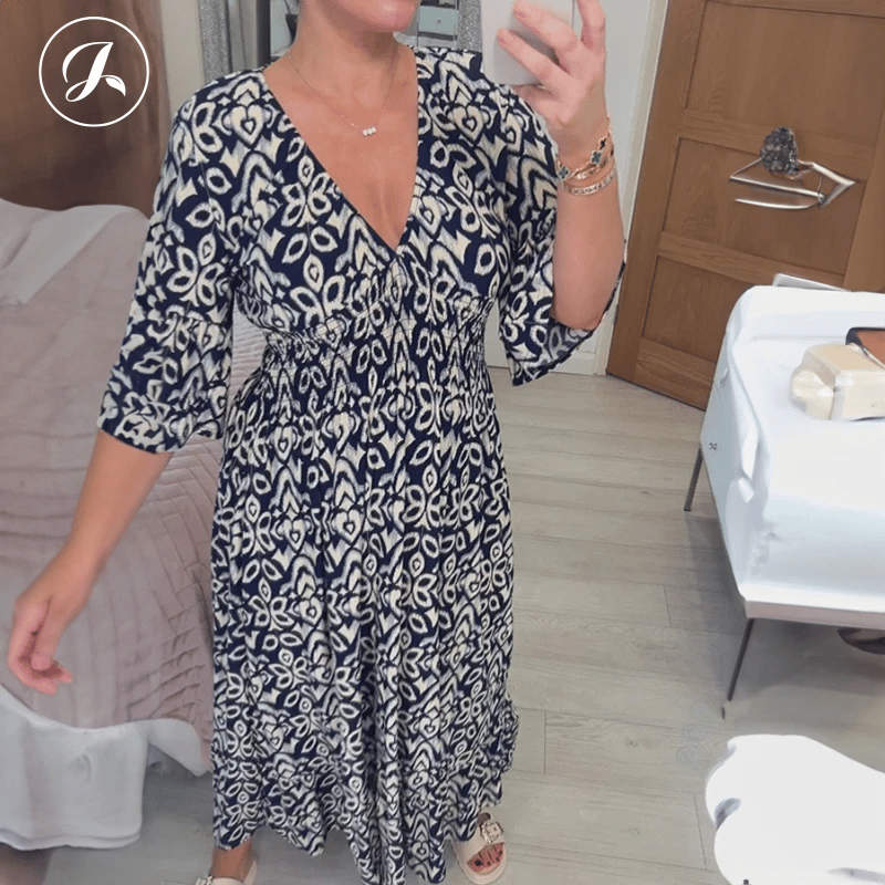 👗Bohemian casual print V-neck shirred waist long dress
