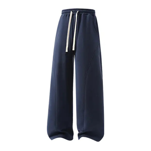 Men's solid-color drawstring trousers featuring a curved cut design.