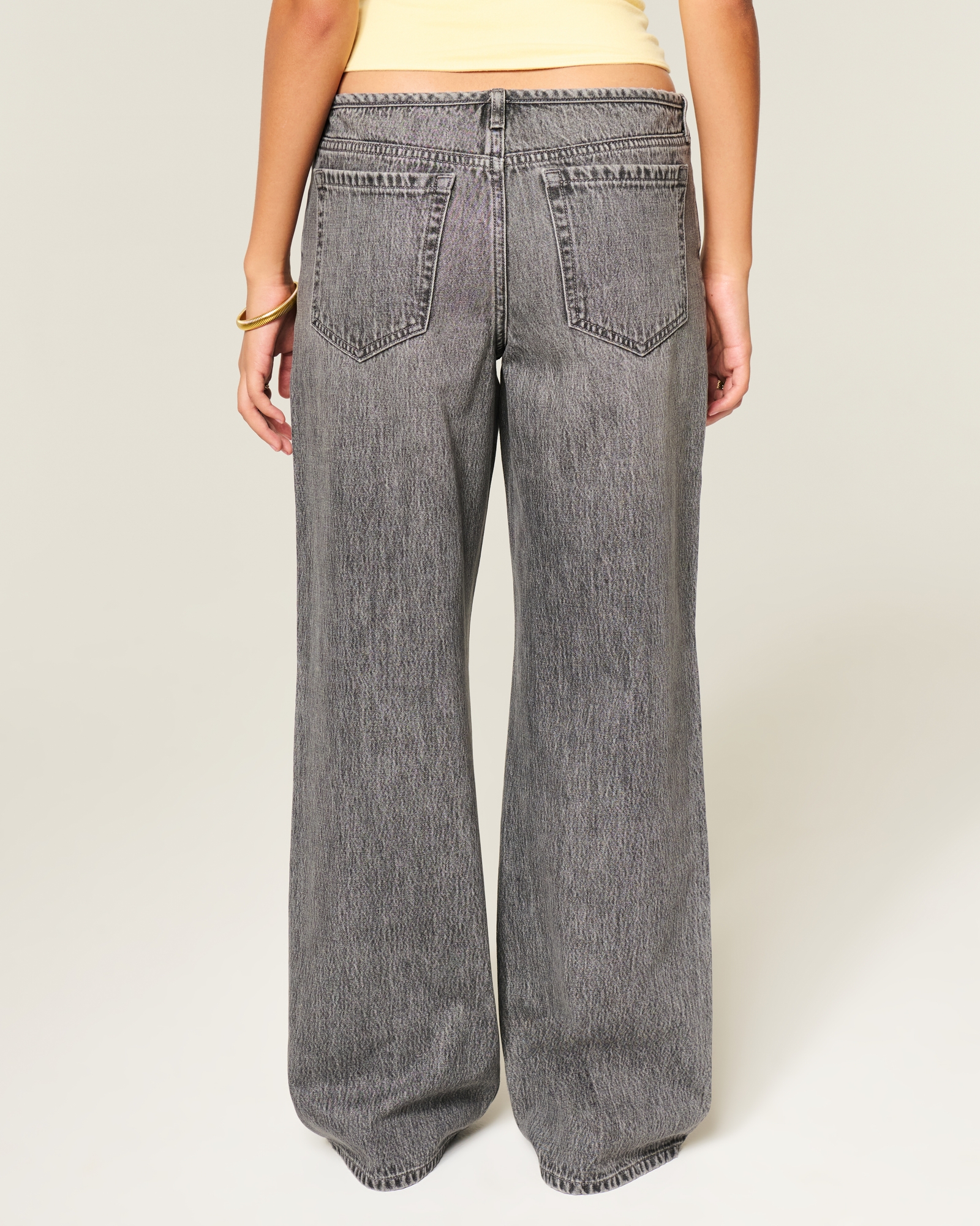 Ultra Low-Rise Light Wash Buckle Back Baggy Jeans