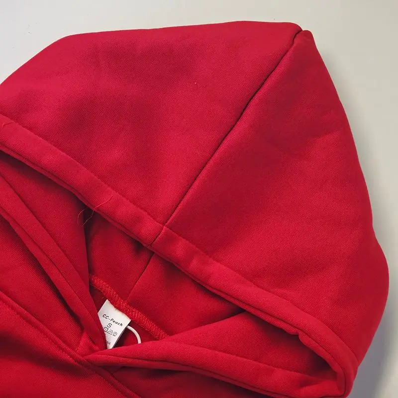 Women's loose-fitting hooded sweatshirt, a comfortable and warm winter sweater, and a stylish autumn top.