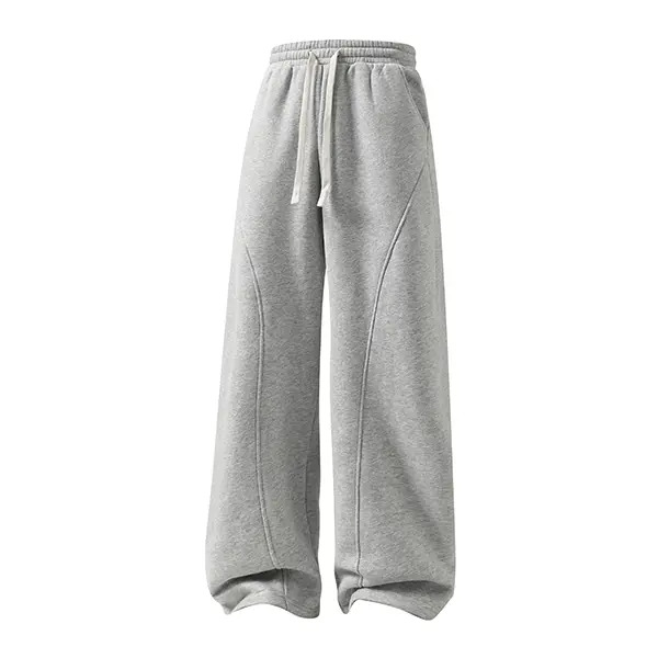 Men's solid-color drawstring trousers featuring a curved cut design.