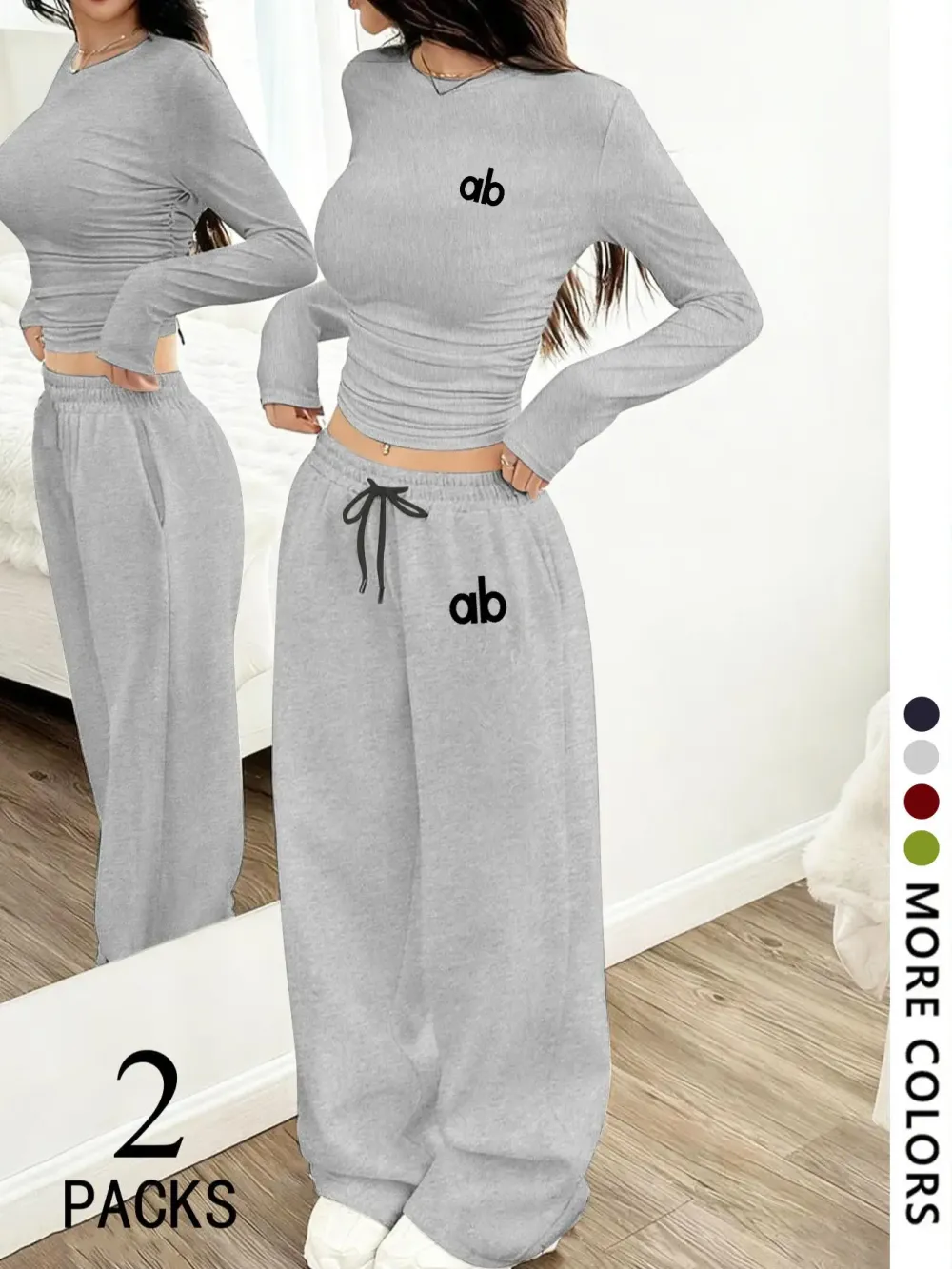 Women's two-piece set: a casual, loose-fitting long-sleeved top paired with straight-leg trousers.