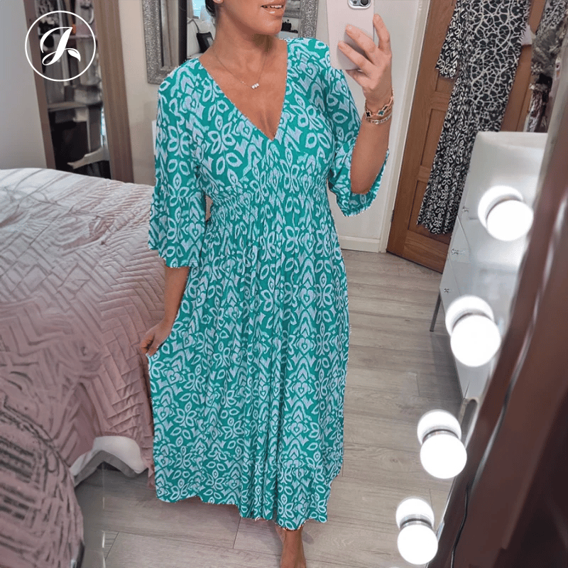 👗Bohemian casual print V-neck shirred waist long dress