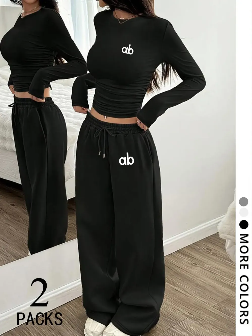 Women's two-piece set: a casual, loose-fitting long-sleeved top paired with straight-leg trousers.