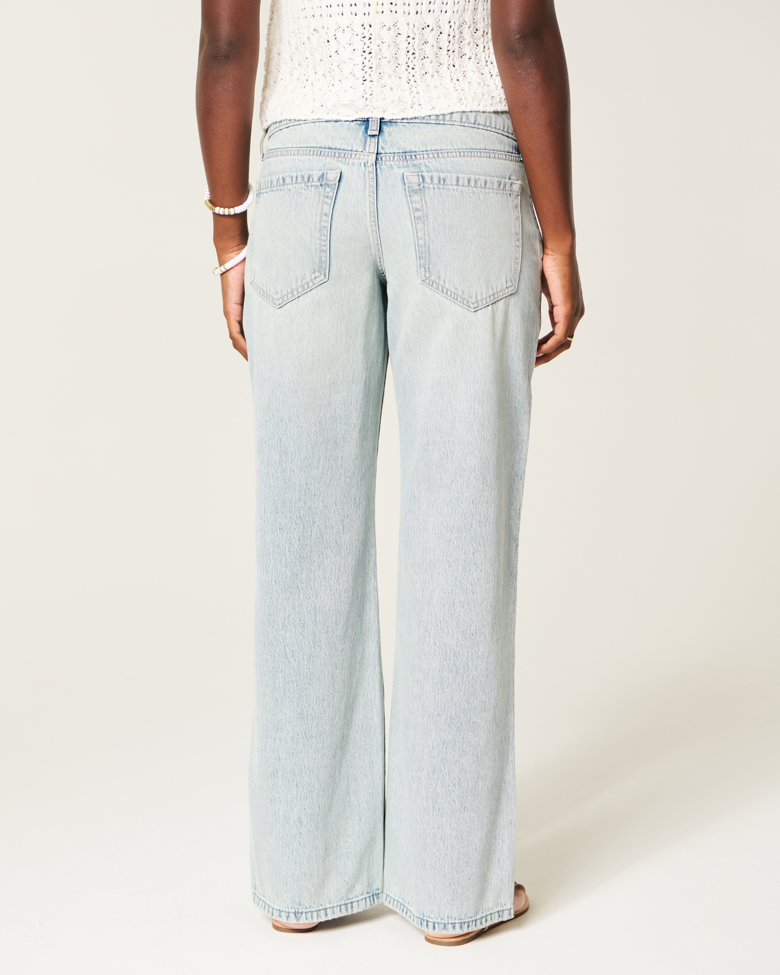 Ultra Low-Rise Light Wash Buckle Back Baggy Jeans