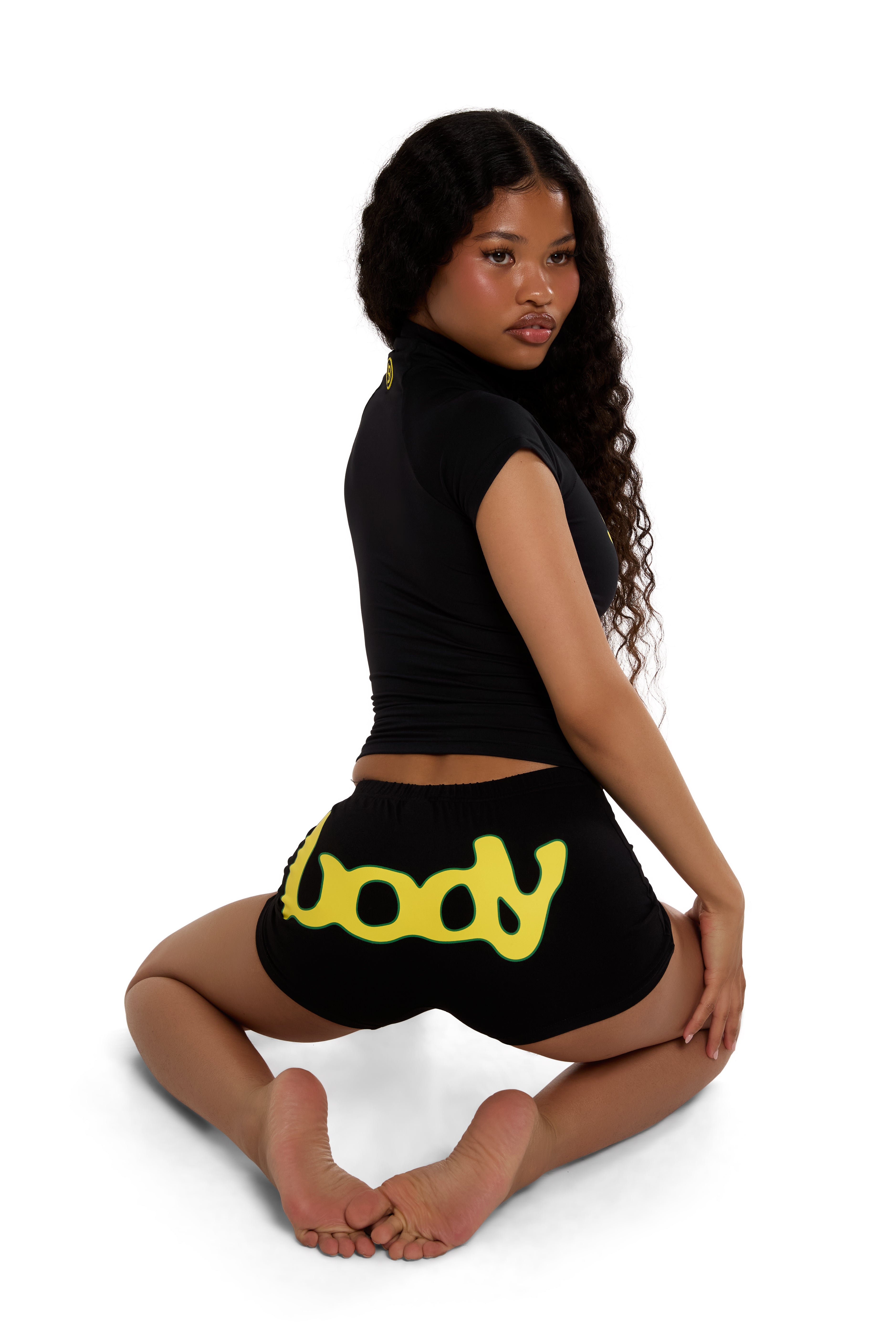 BODY X LATTO MINI SHORTS (BLACK/YELLOW)