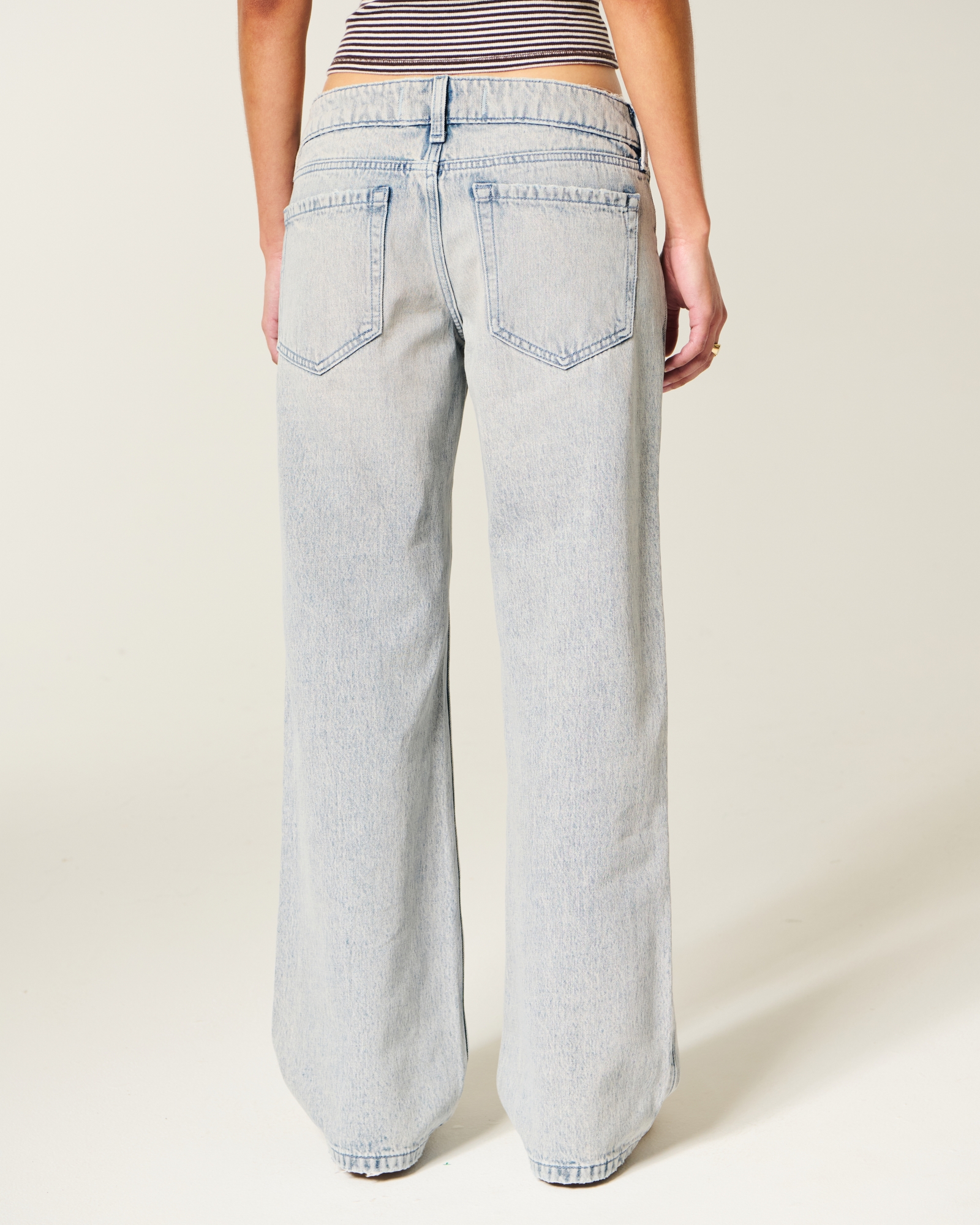 Ultra Low-Rise Light Wash Buckle Back Baggy Jeans