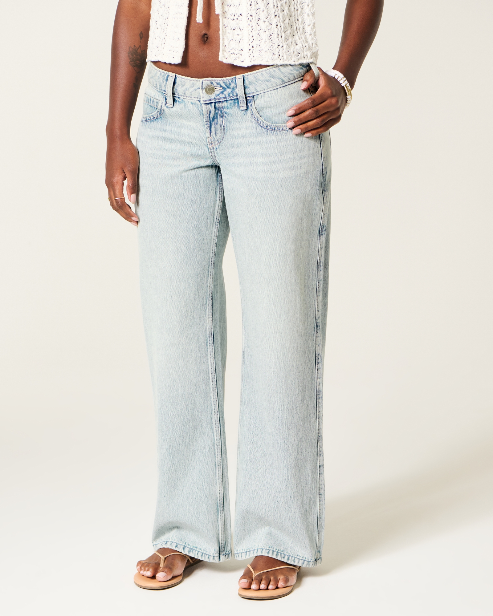 Ultra Low-Rise Light Wash Buckle Back Baggy Jeans
