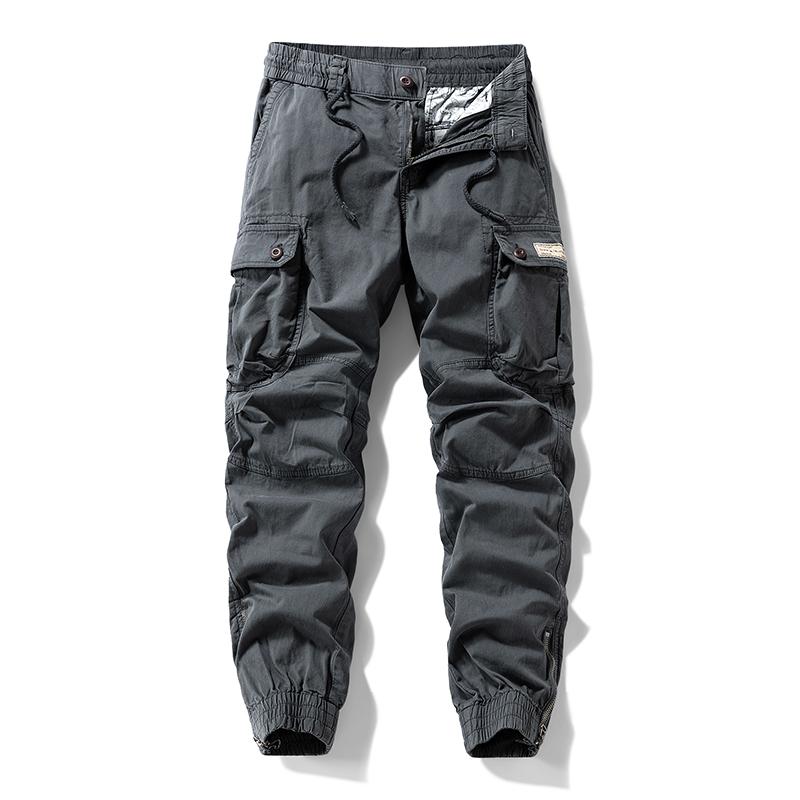 Versatile trendy functional cargo pants for men — drawstring cuffs, multiple pockets, retro outdoor casual style
