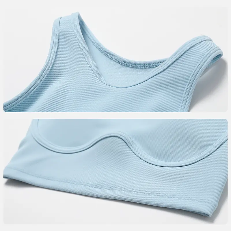 High-waisted seamless sweatpants paired with a padded elastic bra two-piece set